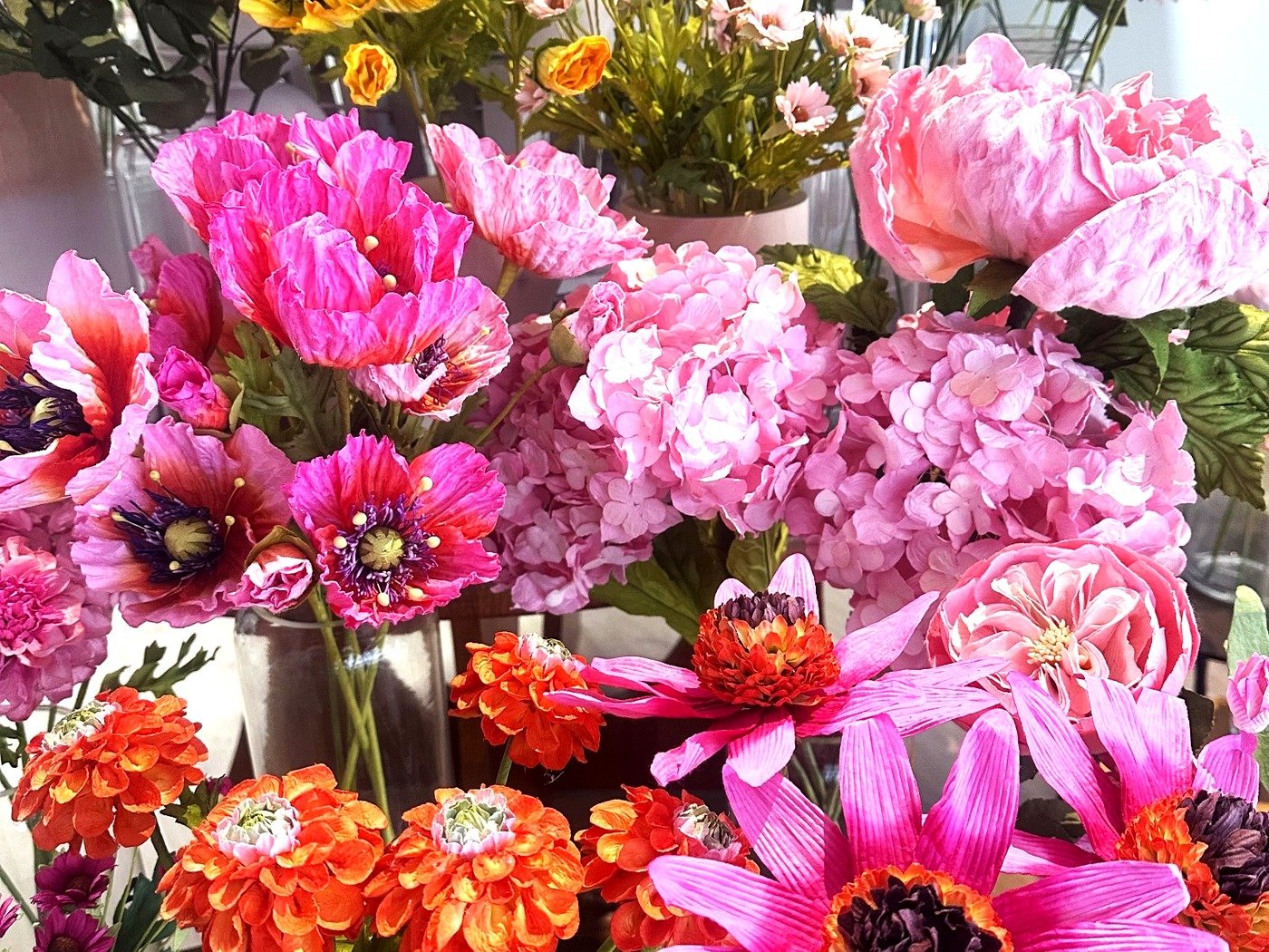Garden style beaded flowers in a painted jar